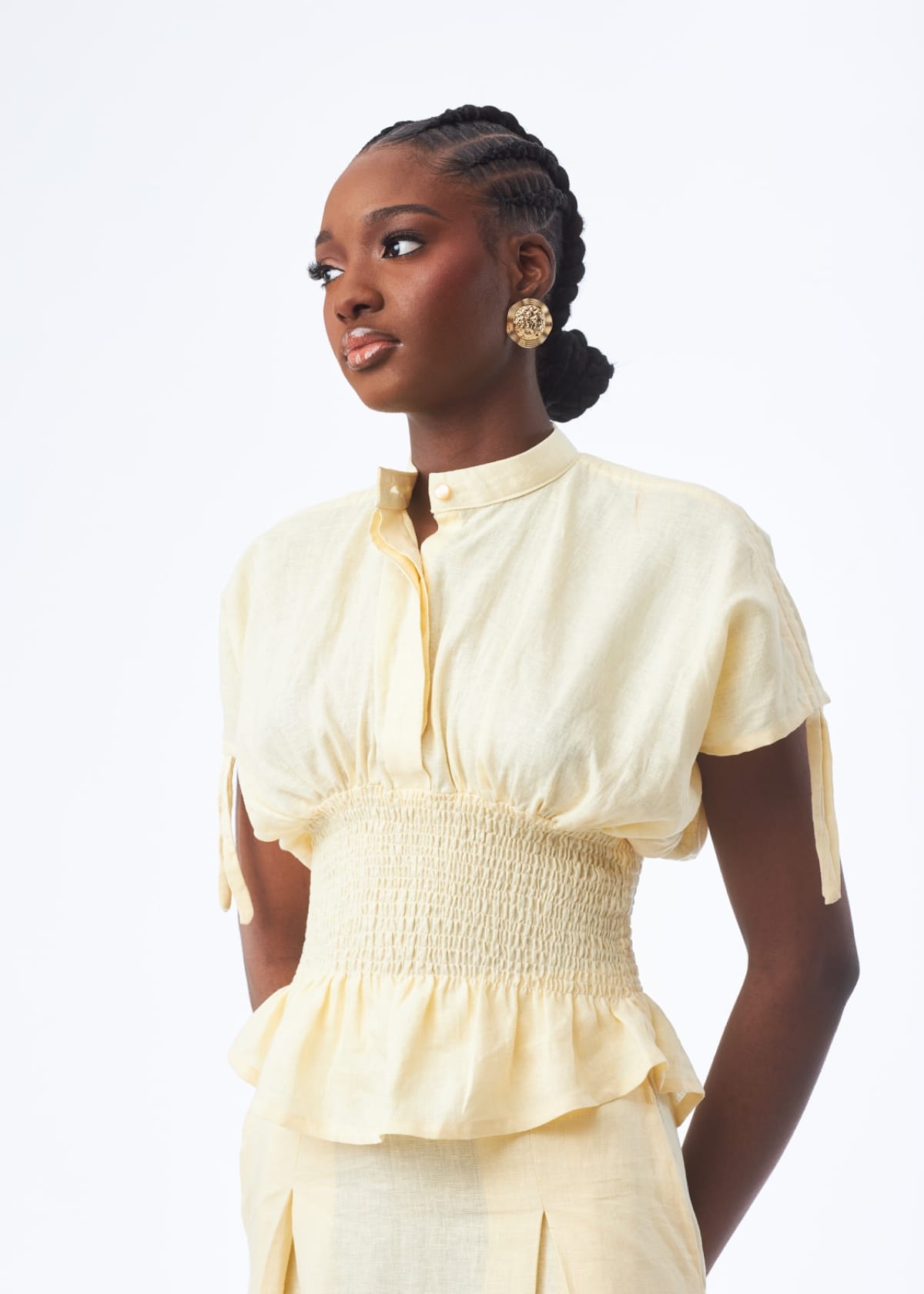 Kwelaku Shirts & Blouses Smocked Peplum Blouse